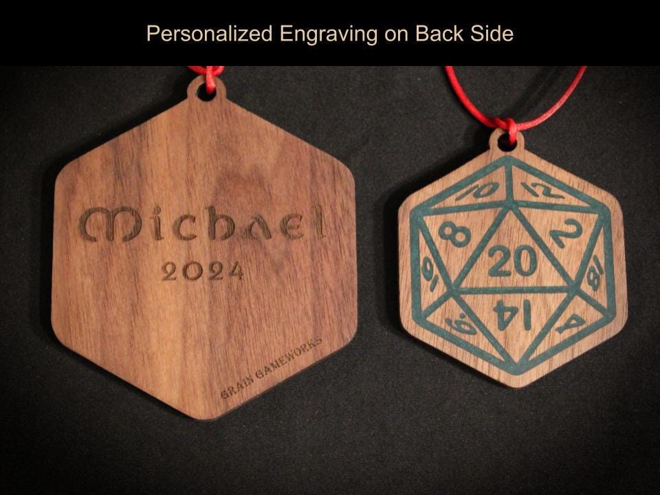 Black Walnut Christmas ornaments in 3 and 4 inches sizes, in the style of a D20 dice, with personalized engraving on back.